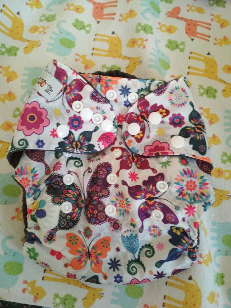 личное фото - подгузник на максимальном размере(все кнопочки по высоте расстегнуты)