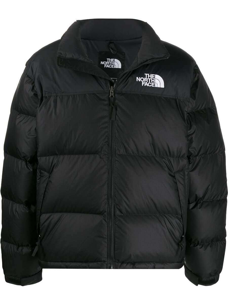 Пуховик 1996 Retro Nuptse от The North Face. Принт с логотипом спереди, застежка на молнии спереди, стоячий воротник, длинные рукава и обитая внутренняя сторона. Цвет: черный.