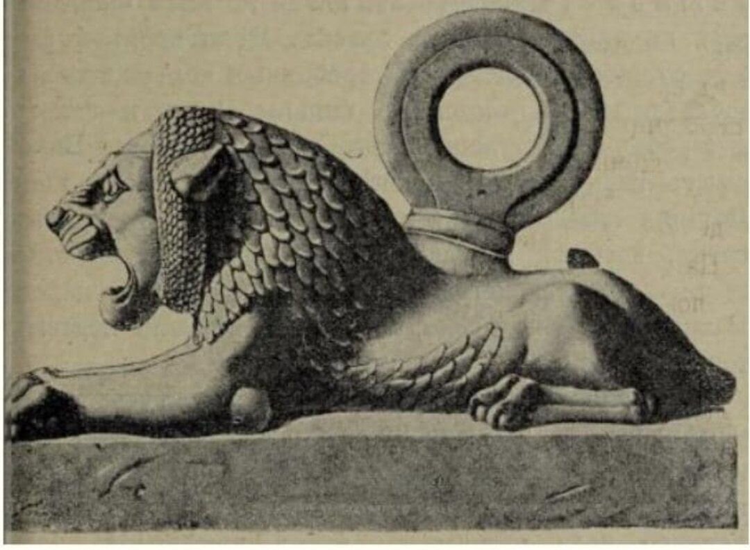 Гиря в виде льва.