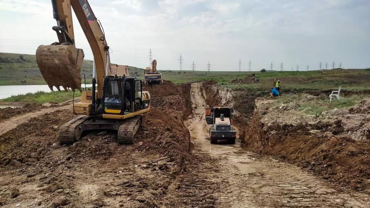    Строительство дамбы для предотвращения подтоплений на реке Булганак под Керчью© РИА Новости / Администрация города Керчь