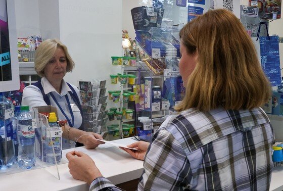    Посетители в отделении «Почты России» в Москве