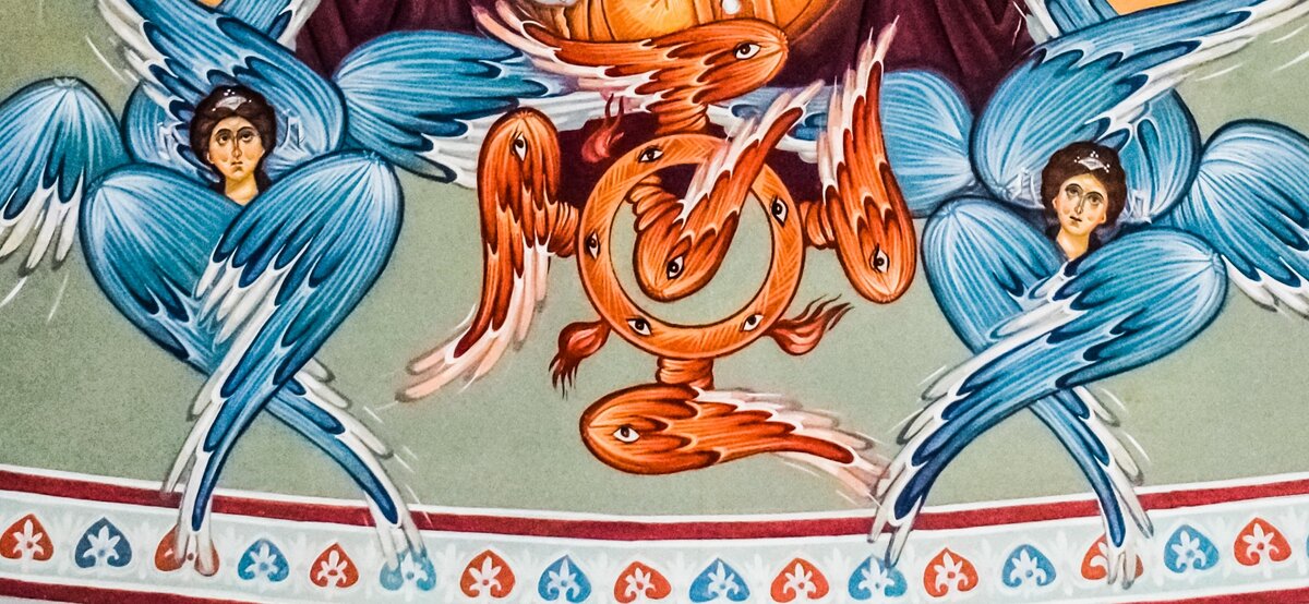 Серафимы по краям и херувим посередине