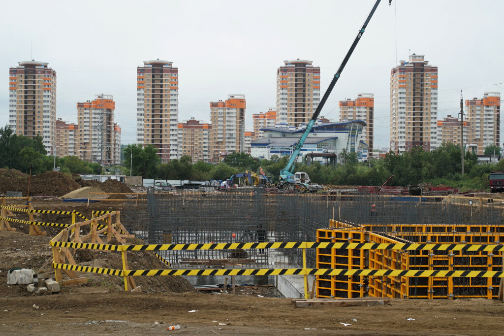 Строительство в хабаровском крае. Стройка в городе. Застройка. Стройка Хабаровск. Место строительства.