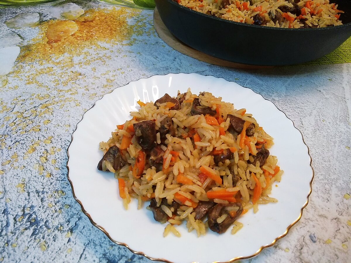 Плов с куриными сердечками