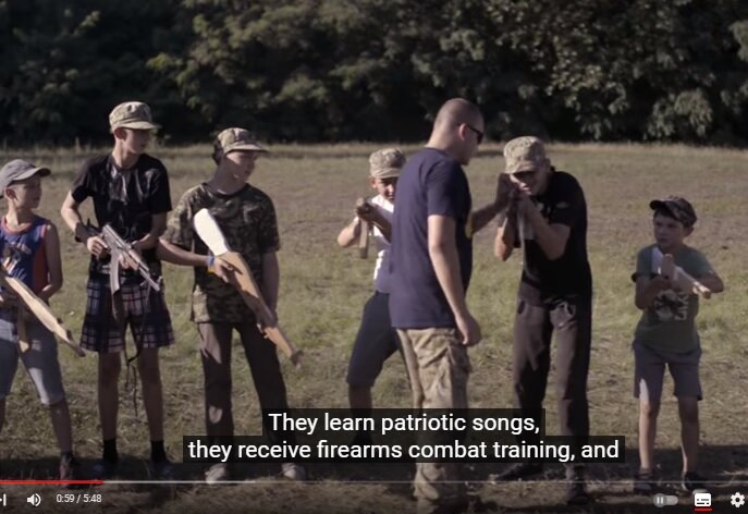 Кадр из видеоролика о военно-патриотическом лагере "Азовец"