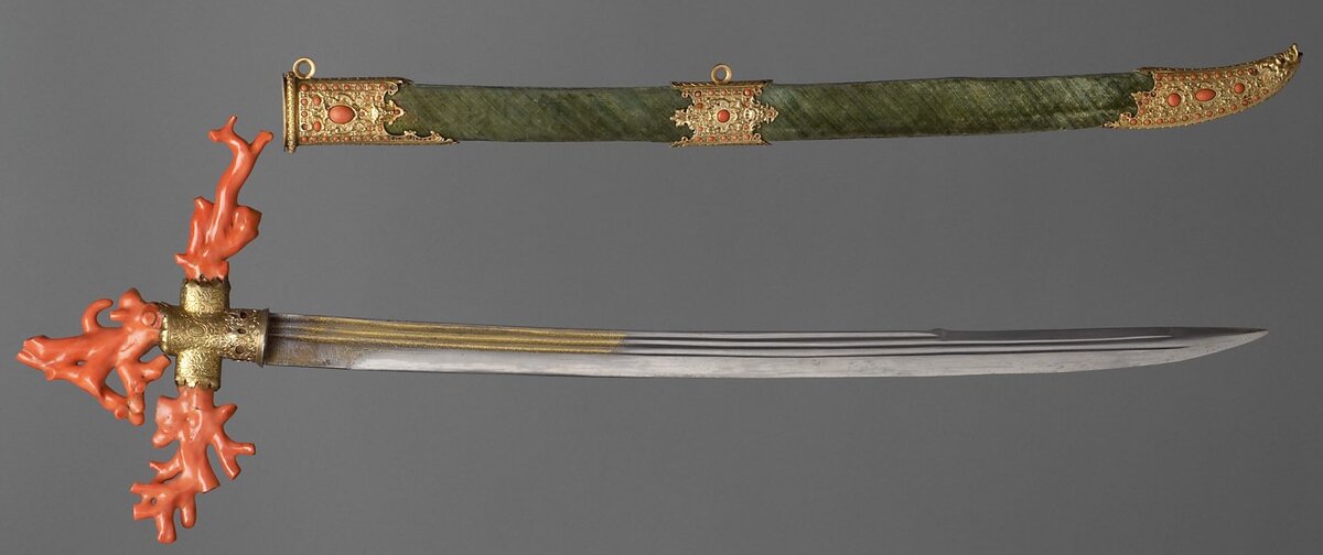 Сабля с коралловым эфесом и ножнами с зеленым бархатом (ок. 1560 г.).
