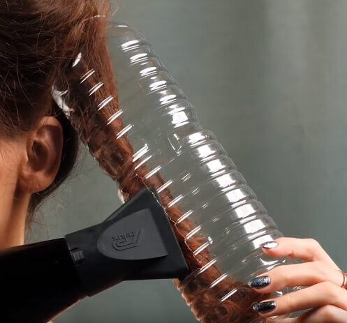 Фото: процесс завивки волос с помощью фена