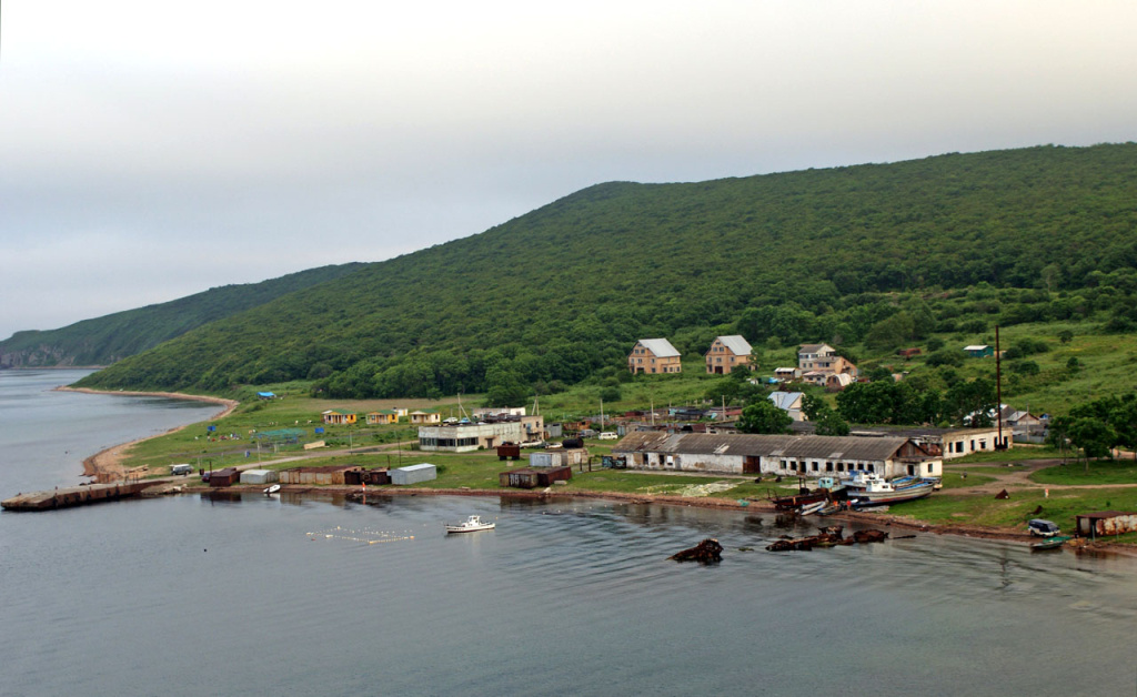 Назван в честь адмирала Андрея Александровича Попова. На острове расположен одноимённый посёлок.