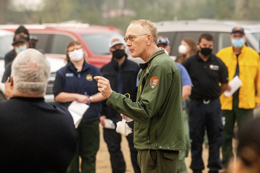 Sequoia and Kings Canyon National Parks Superintendent Clay Jordan speaks with firefighters