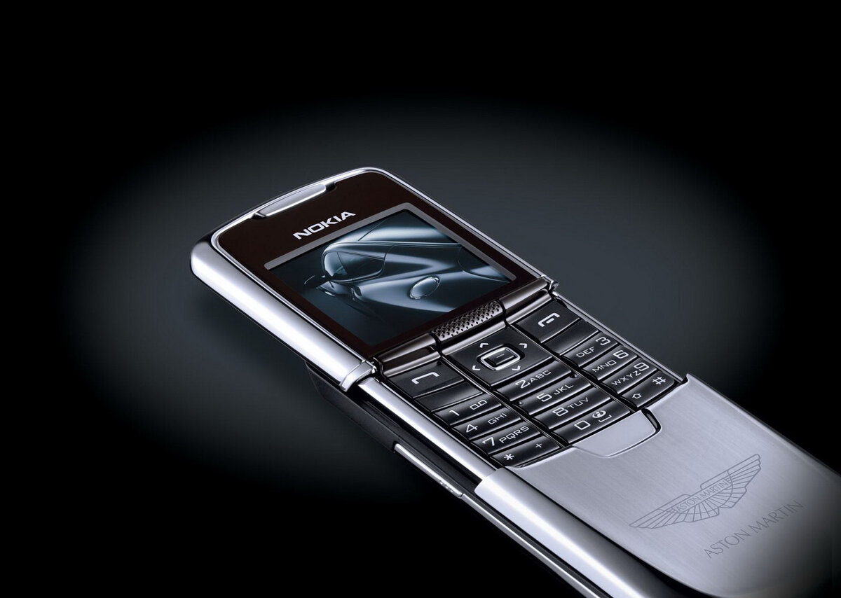 Крутые телефоны 2024. Nokia 8800 Aston Martin Edition. Nokia Aston Martin. Нокия 8800 Астон Марти. Кнопочный телефон элитный Nokia 8800.