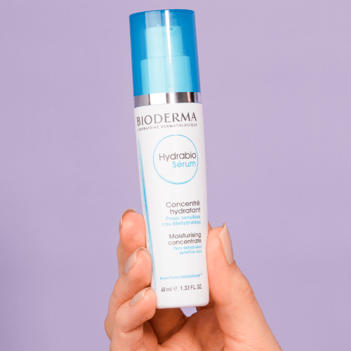 The serum in a hand.