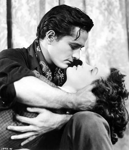 Джон Дерек, кадр из фильма с его участием