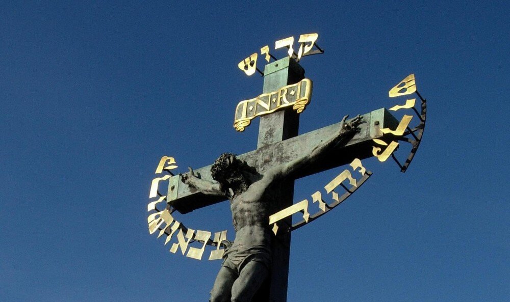 Группа «Распятие» — самая древняя скульптурная группа Карлова моста в Праге, датируемая 1657 годом, в древнееврейской надписи под левой рукой Христа содержит тетраграмматон.