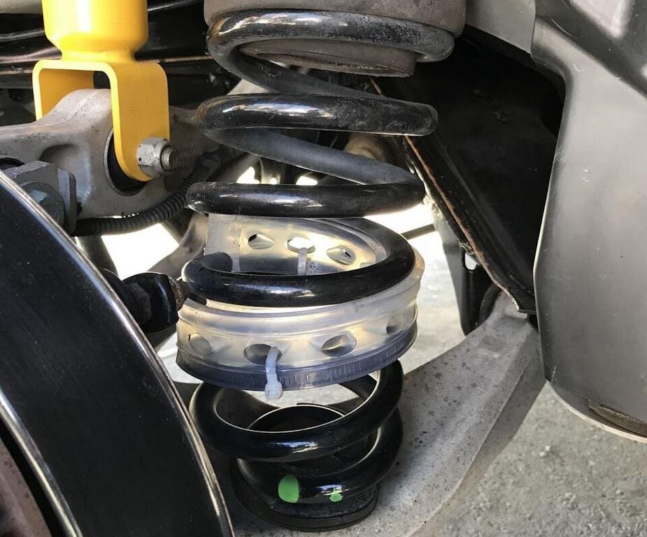 Проставка установленная в пружину