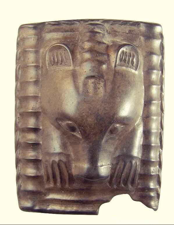 Основные мотивы пермского звериного стиля - изображение животных.