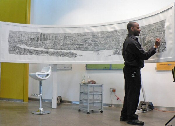 Это Стивен Уилтшир (человек-фотоаппарат) рисует панораму Лондона. Источник: www.matrony.ru