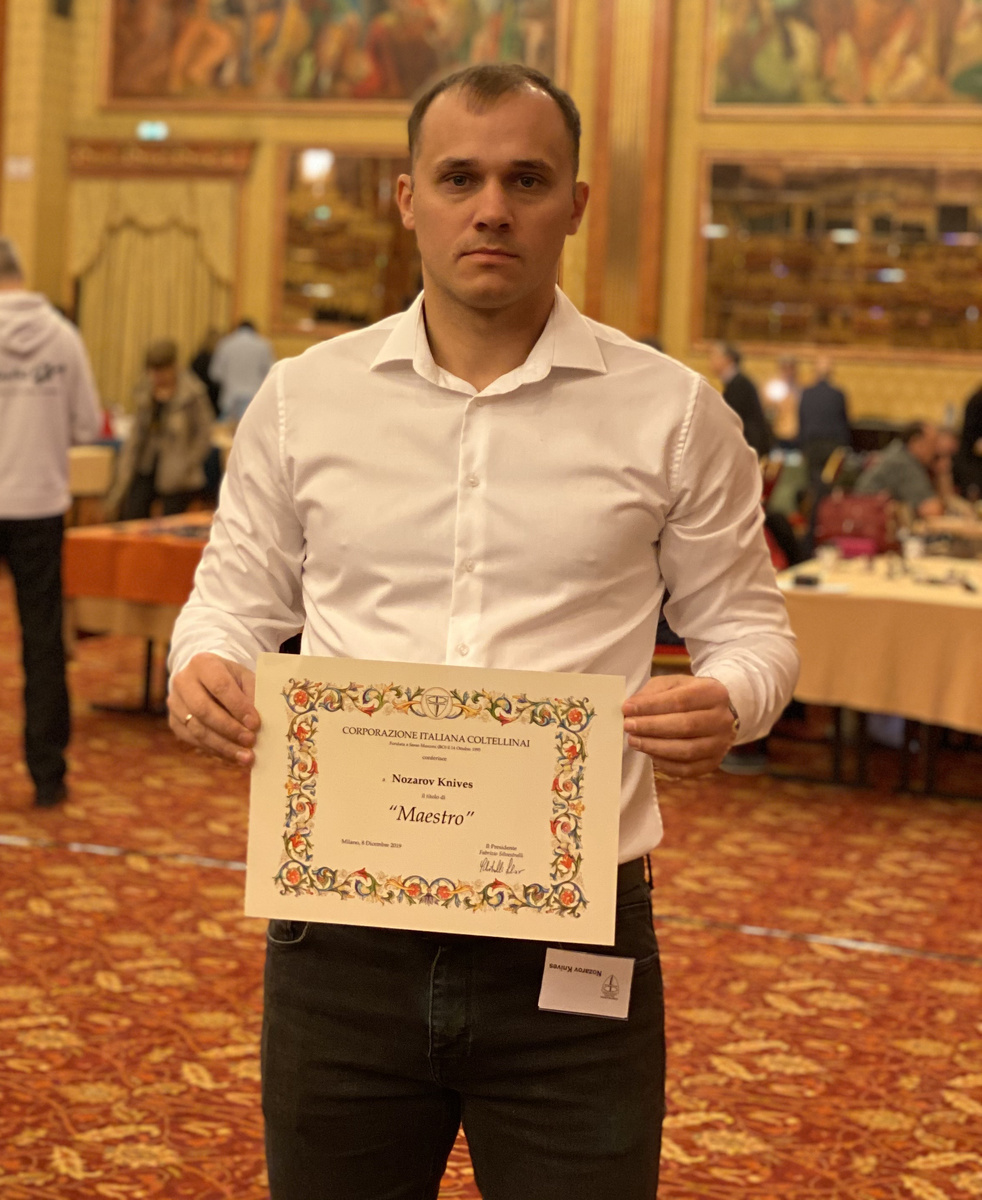 Дмитрий Демков на выставке в Милане