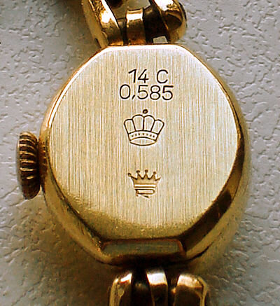 золотые часы с двойной пробой