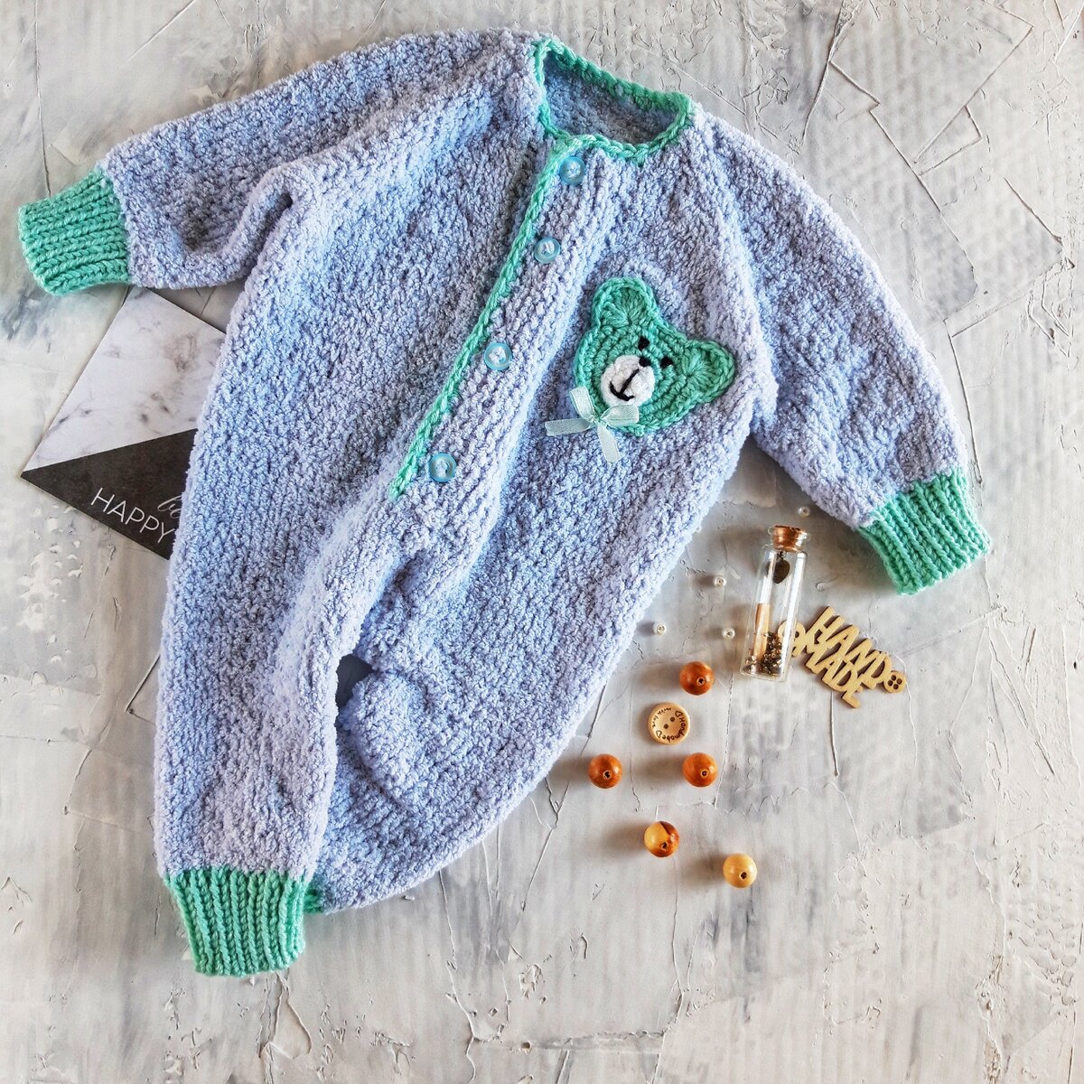 Детский комбинезон спицами 