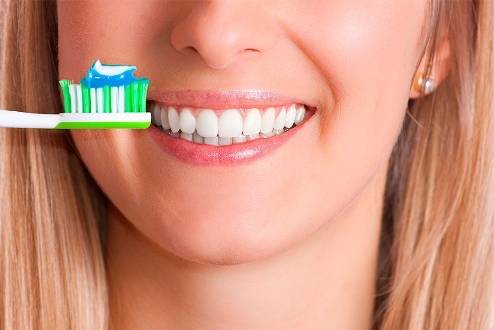 Зубная паста со фтором или без - что лучше, вред и польза фтора