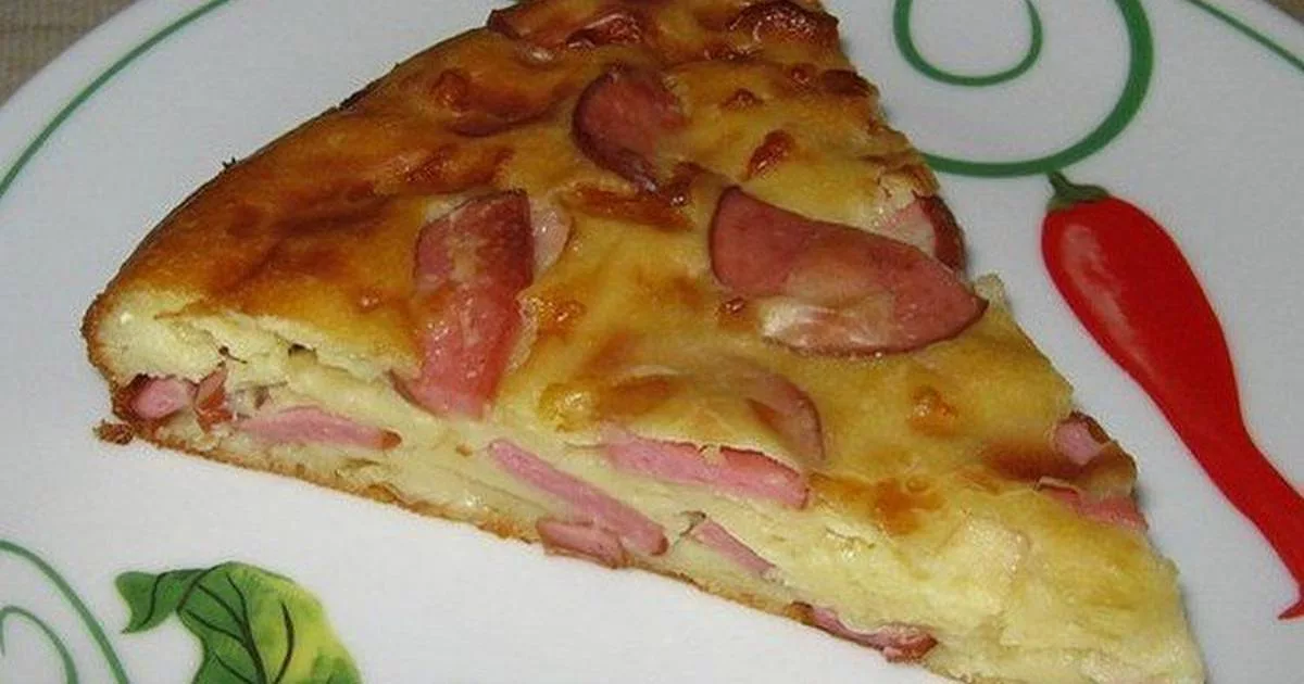 пирог с колбасой в духовке. пирог с колбасой в духовке. кекс с колбасой и сыром в духовке. пирог с колбасой и сыром. пирог с сосисками и сыром на кефире.