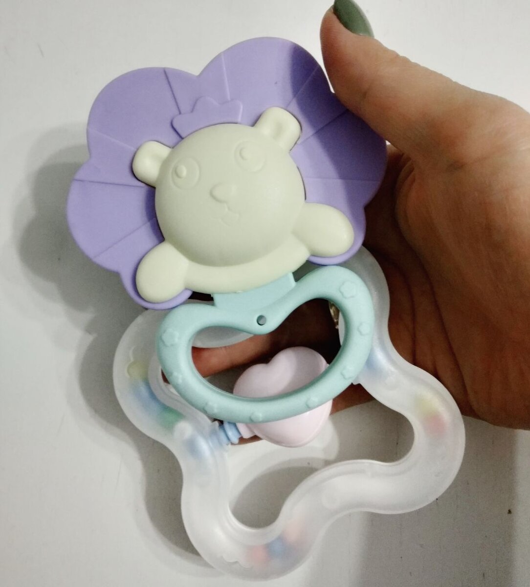 Погремушки, который я выбрала, но там целый набор