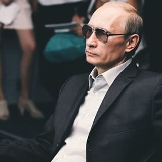 Путин пошутил над занявшей его кресло