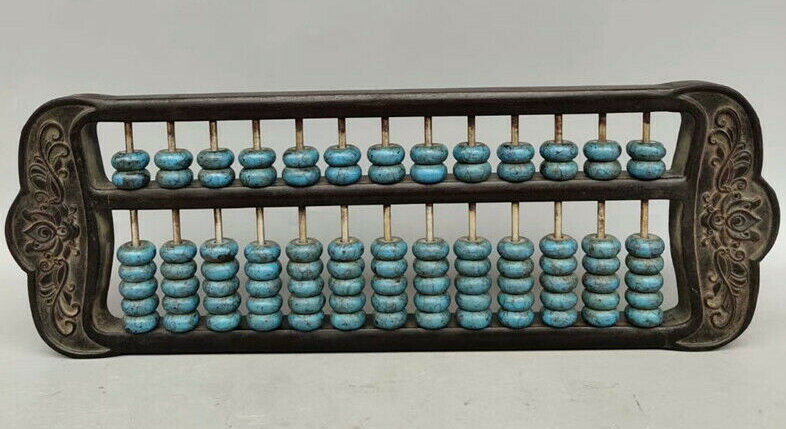 Старинные счеты с бусинами из бирюзы.