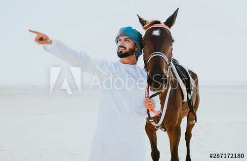 https://stock.adobe.com/ru/images/arabian-man-with-traditional-clothes-riding-his-horse/287172180