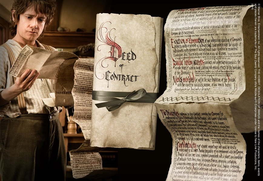 Бильбо с договором из фильма "Хоббит" (фото www.moviefans.ru).