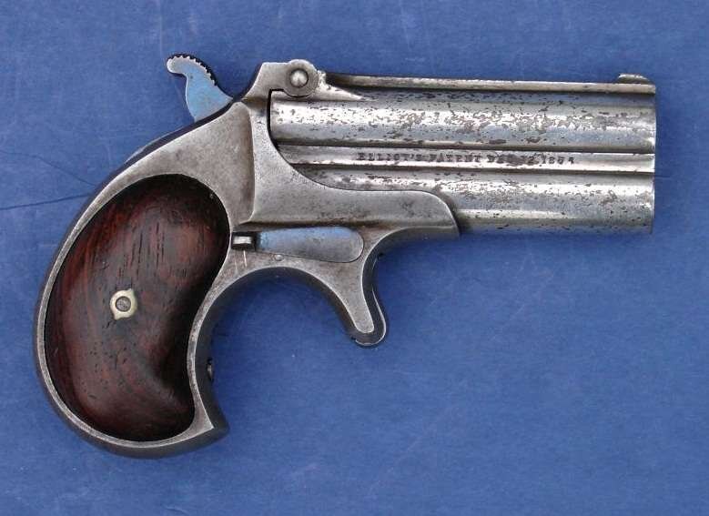Ремингтон Дабл Деринджер - двухствольный карманный пистолет для самообороны.
