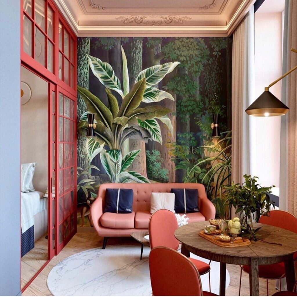 Кроме того, интерьер получился очень рациональный. Квартира площадью всего 29,5 квадратных метров вмести в себя спальню за стеклянной перегородкой и просторную кухню-гостиную с обеденным столом на 4 персоны.