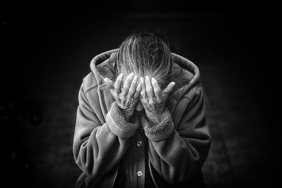 https://pixabay.com/photos/woman-old-senior-desperation-grief-1246587/