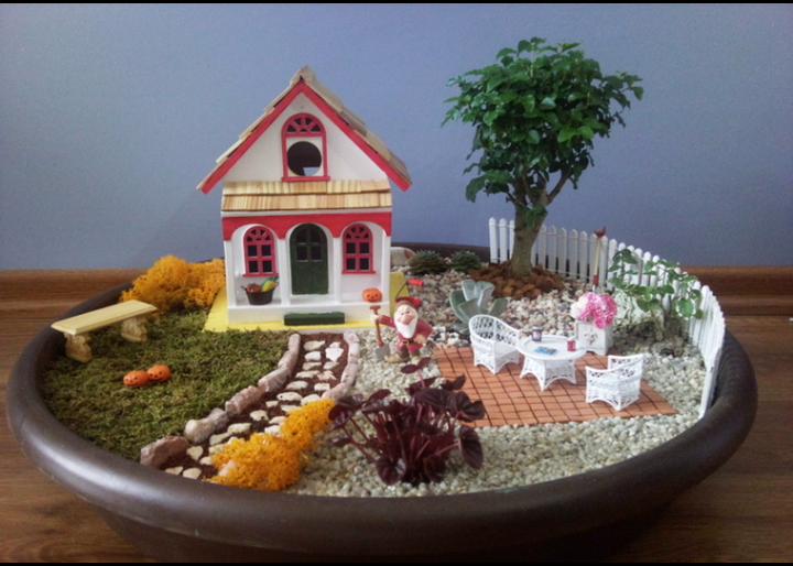 Фигурки в оформлении сада.