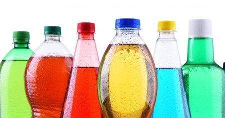https://st3.depositphotos.com/1063437/19318/i/1600/depositphotos_193184678-stock-photo-plastic-bottles-of-assorted-carbonated.jpg