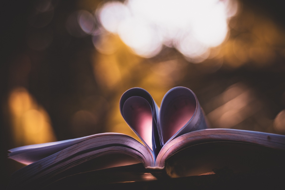 https://burst.shopify.com/photos/pages-of-a-book-curled-into-a-heart-shape?q=book+childre