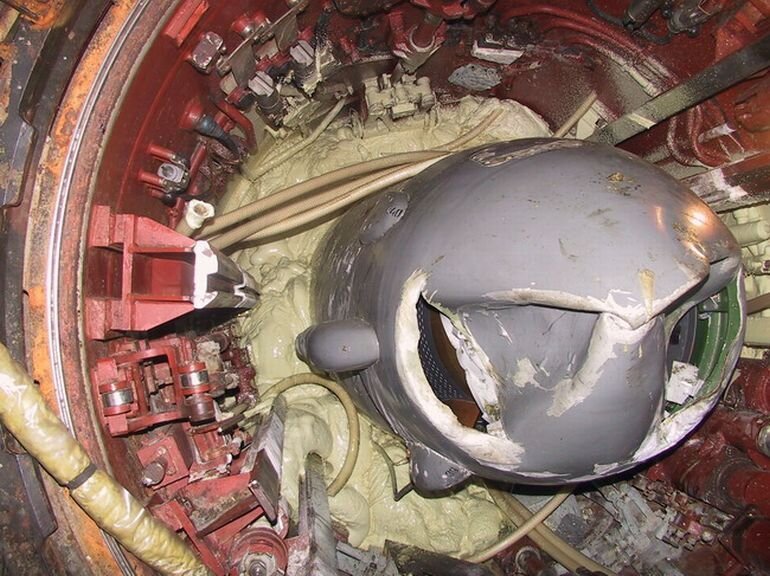 Помятая торпеда,которую достали из Курска после подъёма.