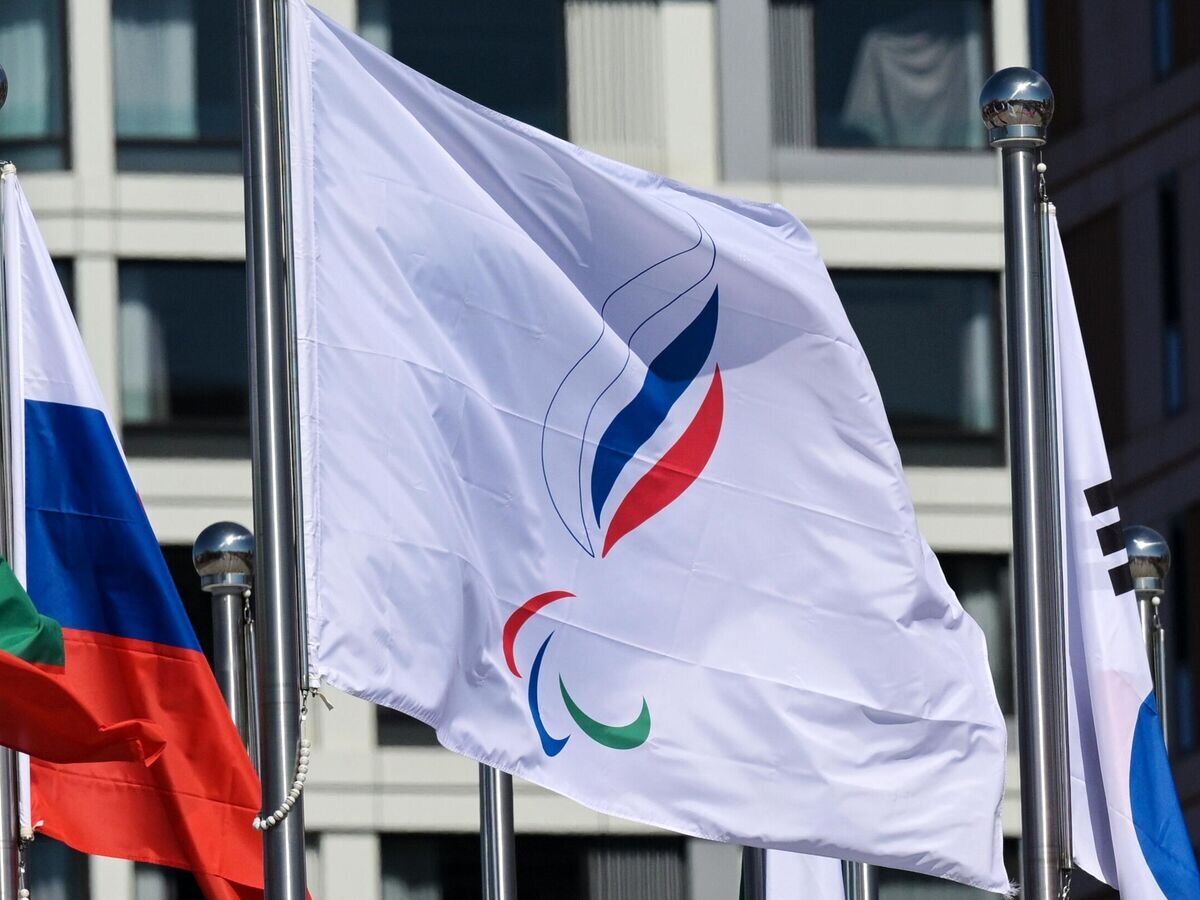    Флаг Паралимпийского комитета России – паралимпийские игры в Пекине.© РИА Новости / Григорий Сысоев