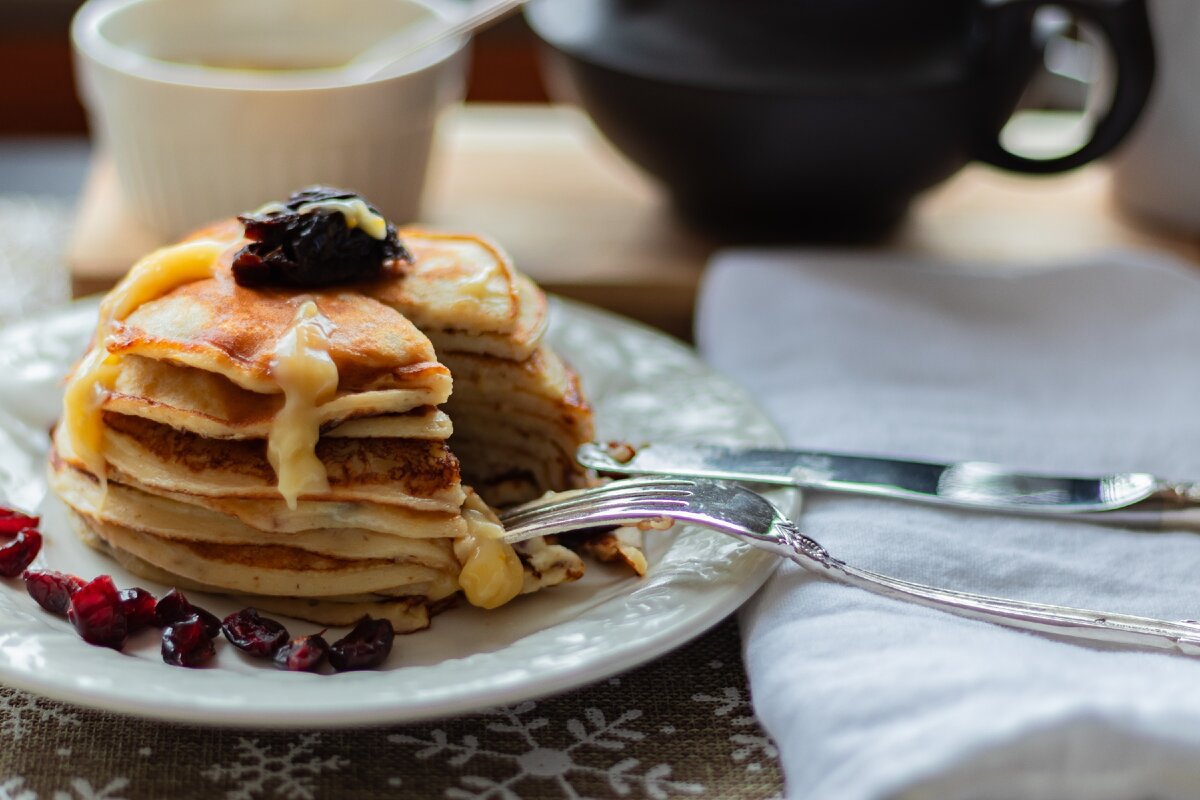 https://www.foodiesfeed.com/free-food-photo/orange-cheese-pancakes/
