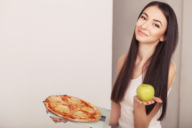 https://image.freepik.com/free-photo/overweight-woman-standing-weighing-scale-holding-pizza_118454-6937.jpg