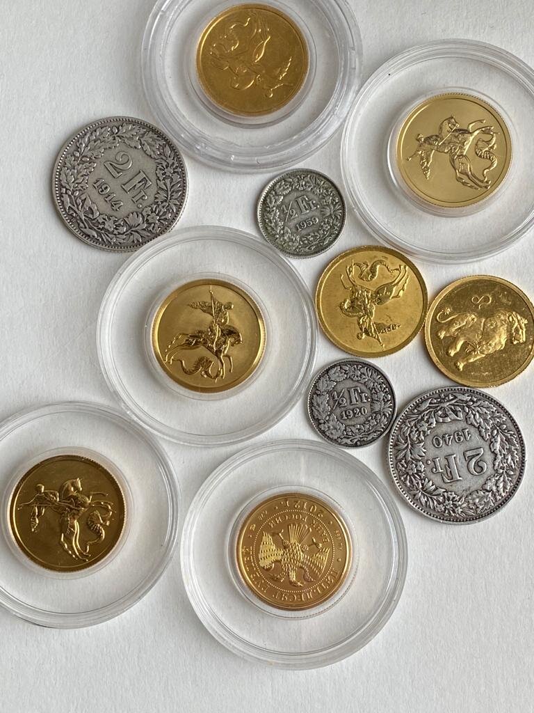 золото и швейцарский франк -  надежные инвестиции