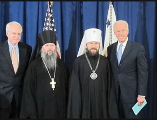 На фото: еретик Алфеев с кандидатом в президенты США Байденом.