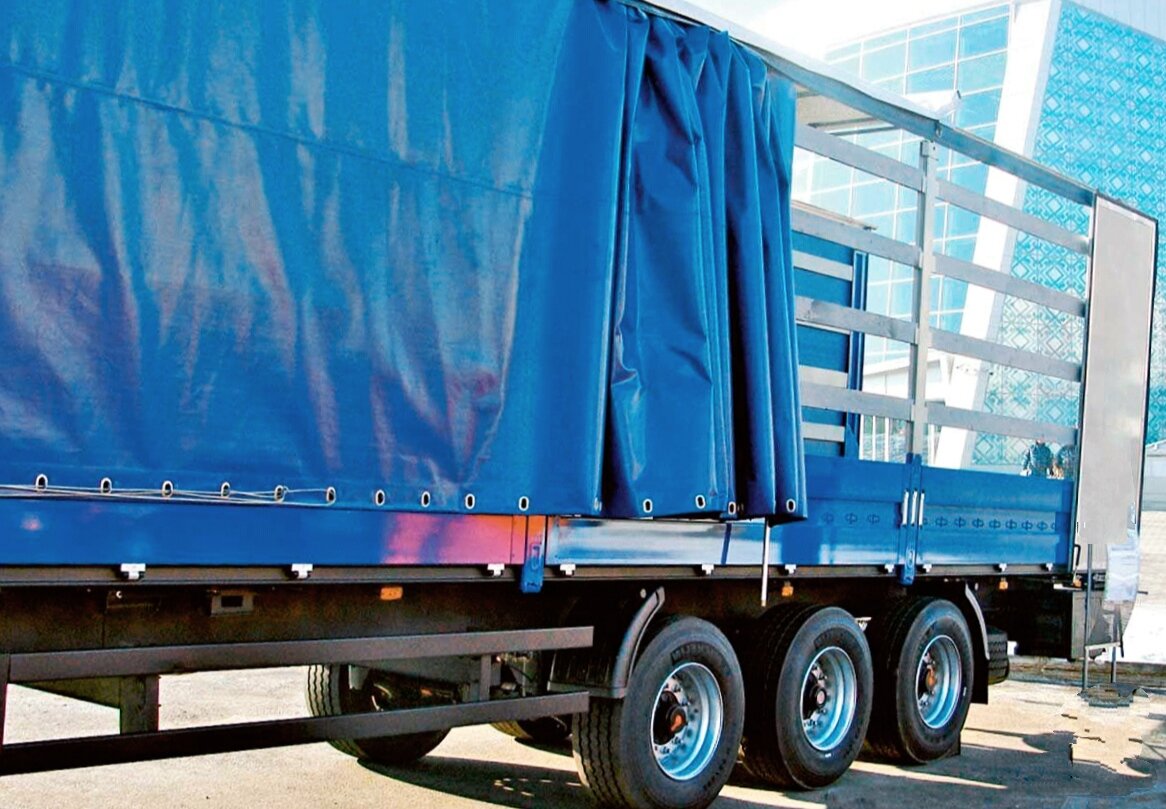 Тентованный полуприцеп. Его ещё называют "шторка". Фото с сайта dag.specdispetcher.ru, обработано автором