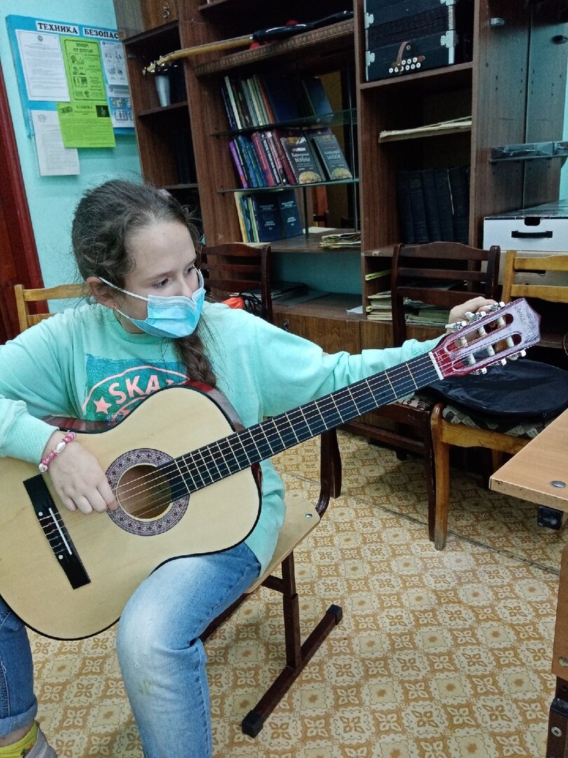 Настройка гитары обучающейся