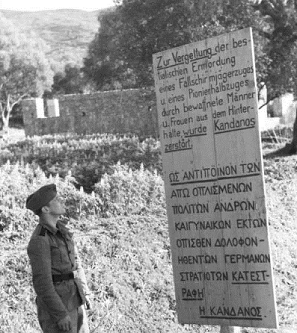 Плакат, установленный на месте разрушения деревни Канданос на о.Крит в 1941 г.