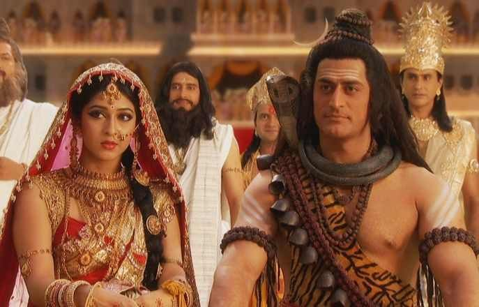 Бог Шива и богиня Парвати в окружении богов и мудрецов.