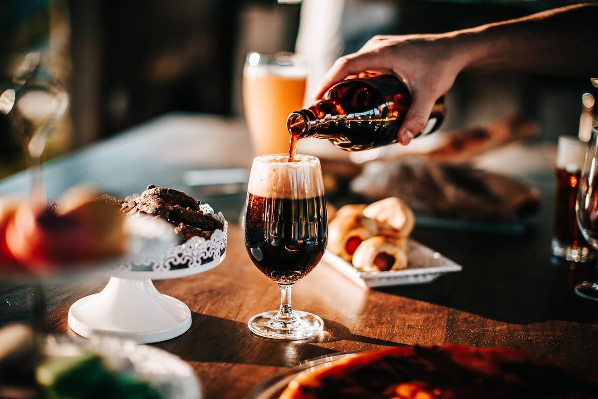 https://www.pexels.com/photo/person-pouring-drink-on-wine-glass-1796698/