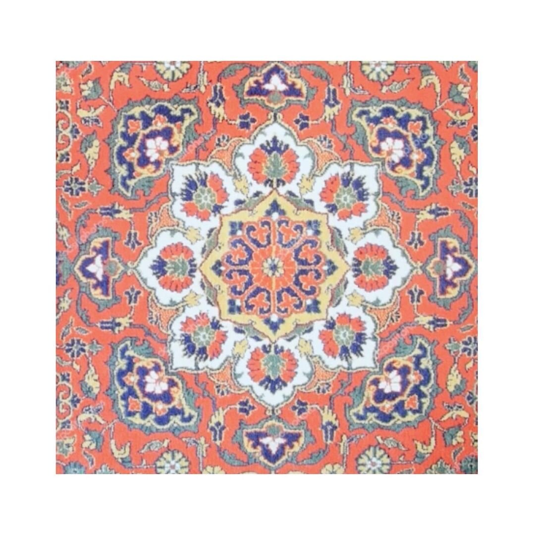 Пример лучевой симметрии в орнаменте ковра.