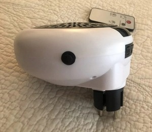 портативный керамический обогреватель в розетку Warm Air Bloower 