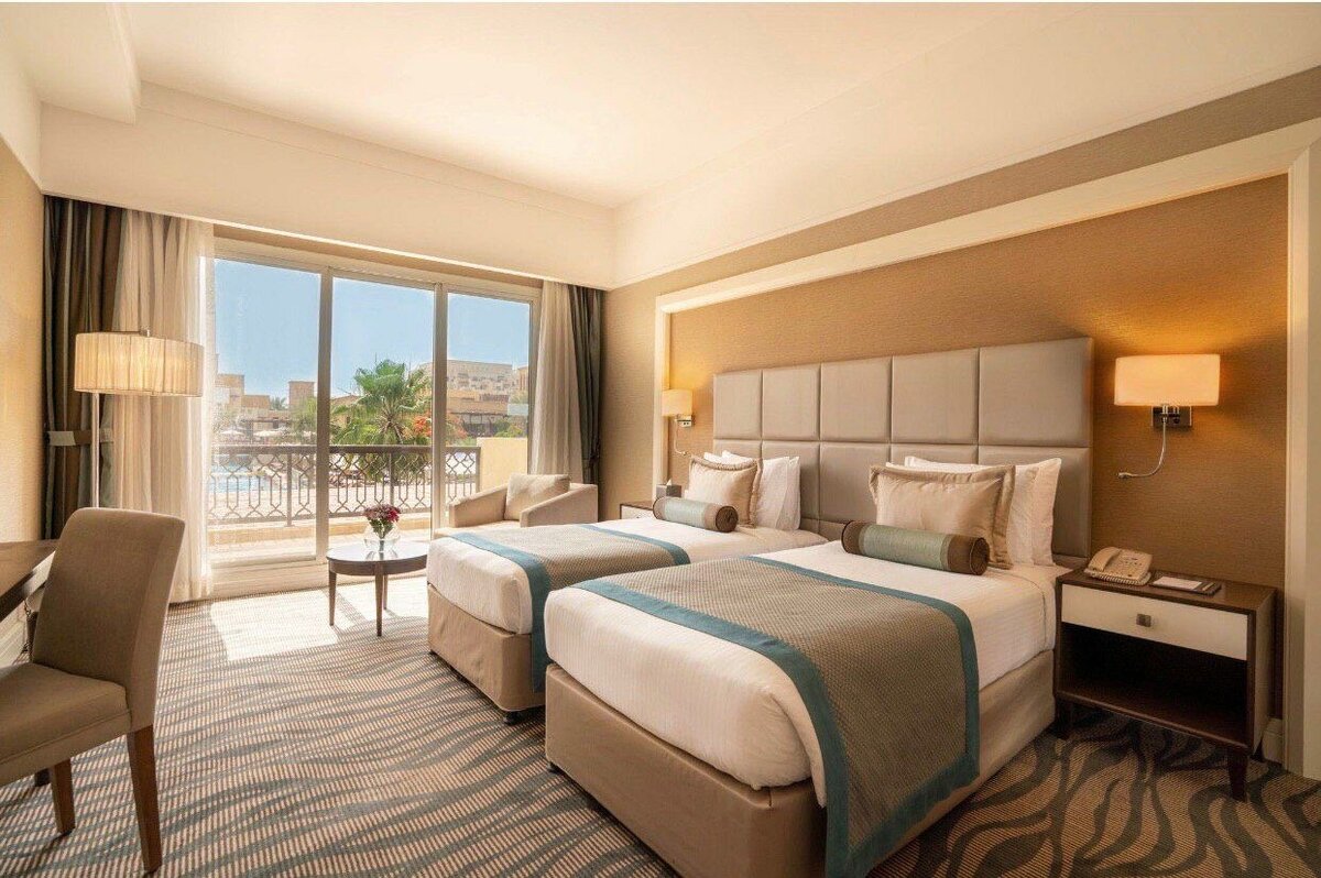 Deluxe с двумя раздельными кроватями в отеле Rixos Bab Al Bahr 5*